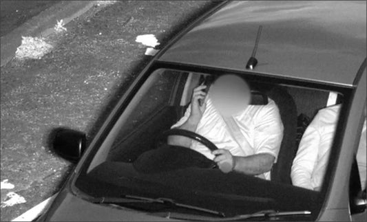 Trial AI tech catches drivers on their phones